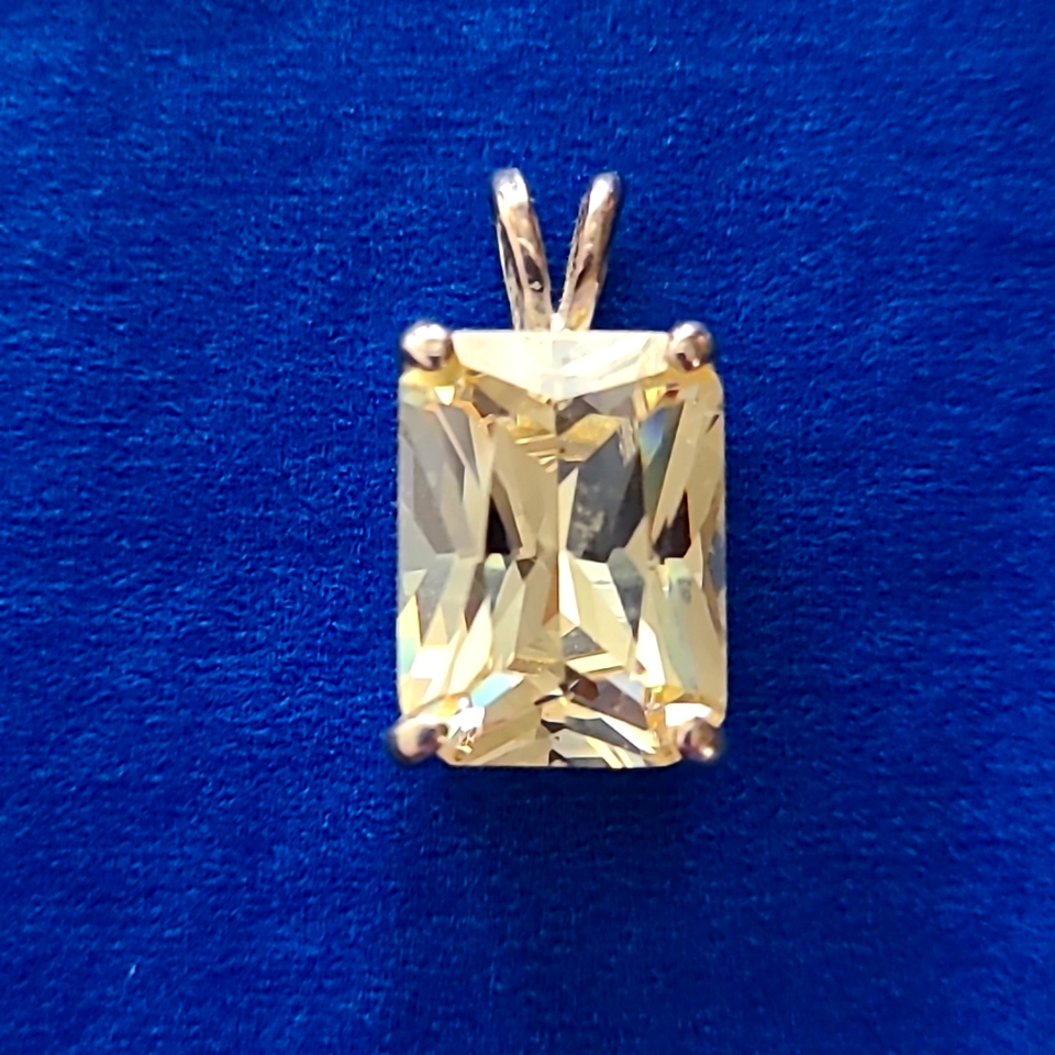 Emerald Cut Cubic Zirconia Citrine Pendant In A Sterling Silver Setting